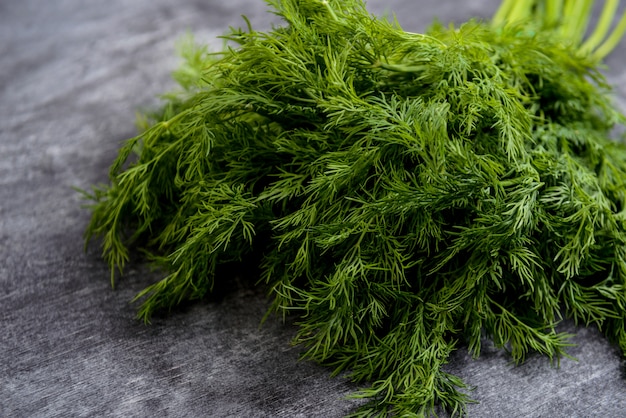 Picture of green dill on grey table