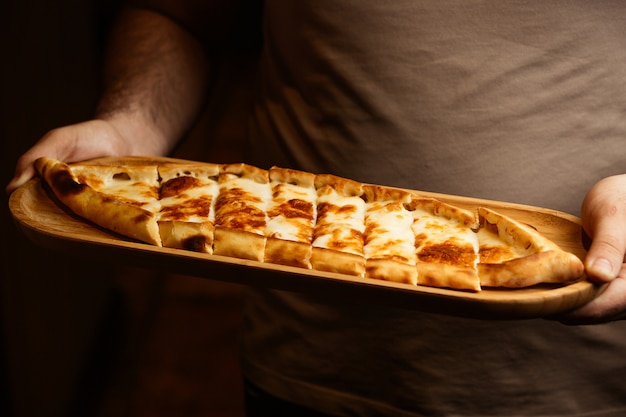 pide topped with melted cheese