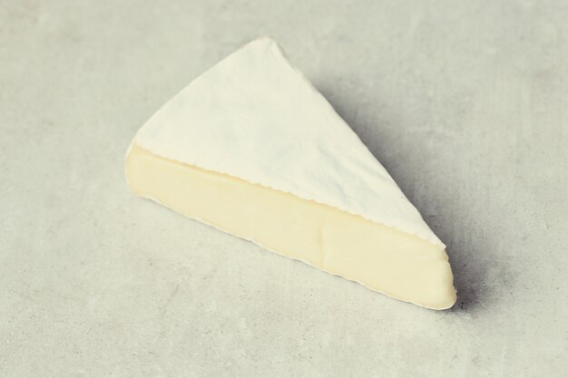 Piece of camembert cheese