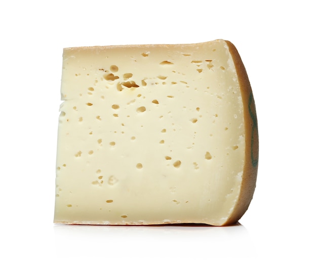 Free photo piece of cheese on a white surface