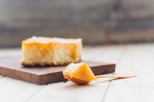 Free photo piece of fresh cake on spoon