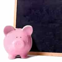 Free photo piggy bank small blackboard