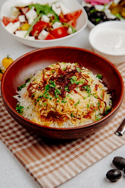 Pilaf with fried onions and beans