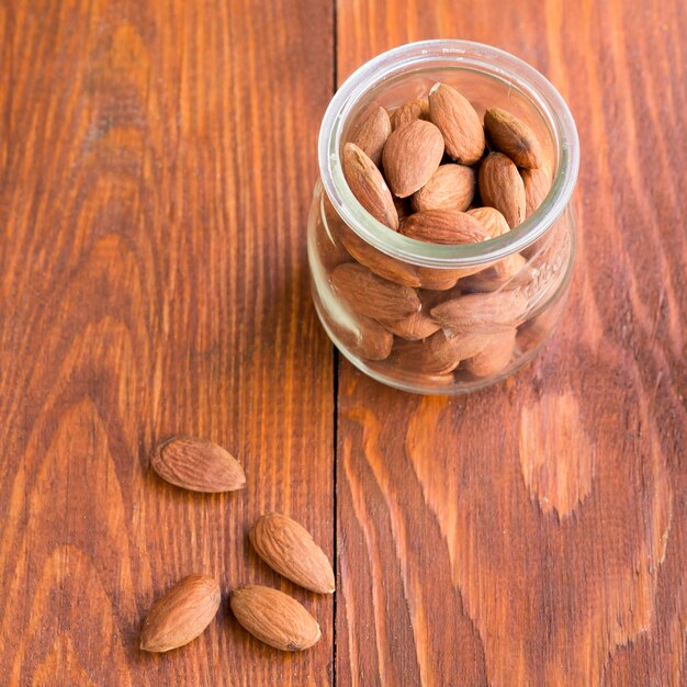 Pile of almonds inside a jar