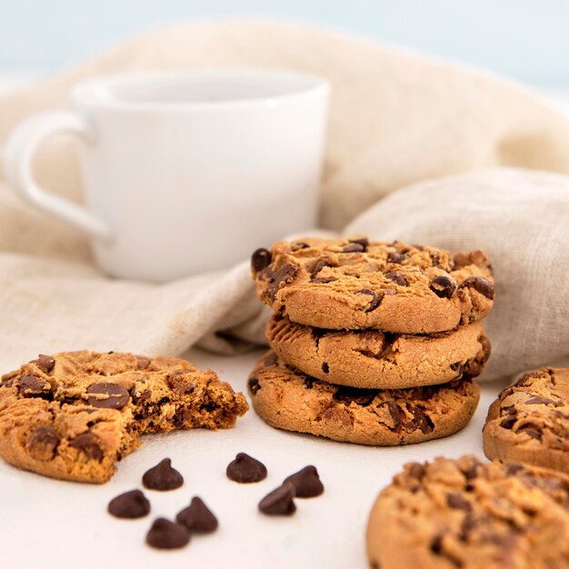 Pile of cookies and coffee front view