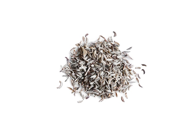 Pile of cumin seeds isolated on white background. Top view. Still life. Copy space. Flat lay