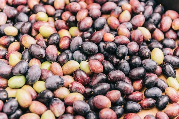 Pile of raw black and green olives