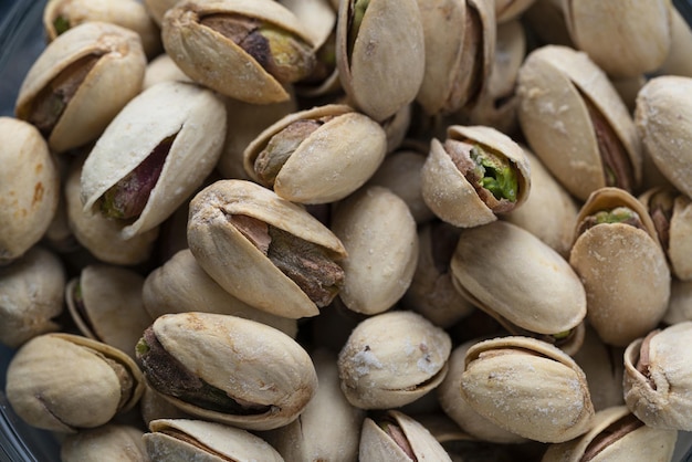 Free Photo pile of roasted and salted pistachios