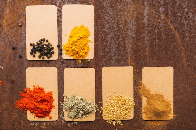 Piles of spices on boards