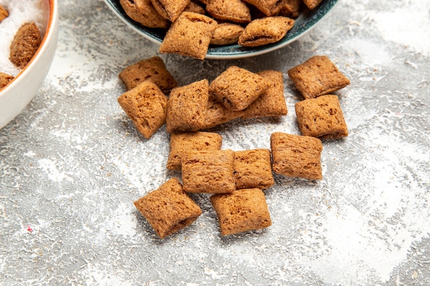 pillow cookies with milk for breakfast on white