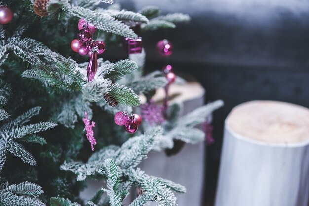 Pine with snowy leaves and candles