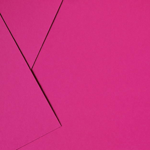 Free photo pink abstract background inspired by material design using cardboard and paper