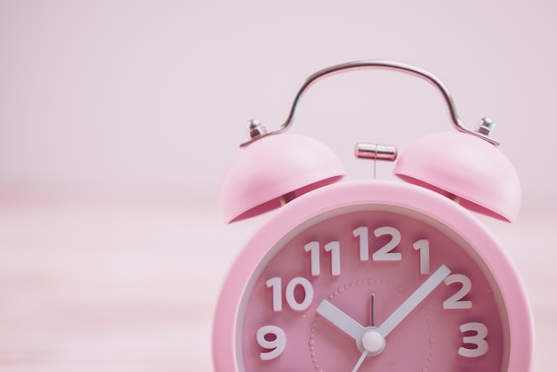 Free photo pink alarm clock