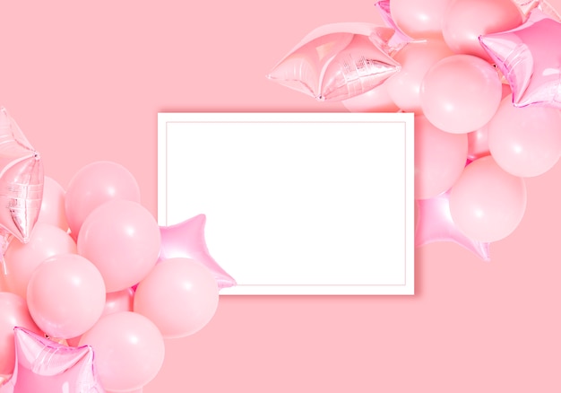 Free photo pink birthday air balloons on pink background with mockup