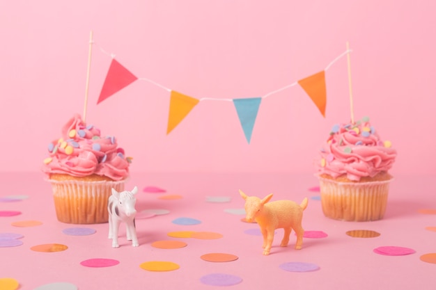 Pink birthday cupcake with garland