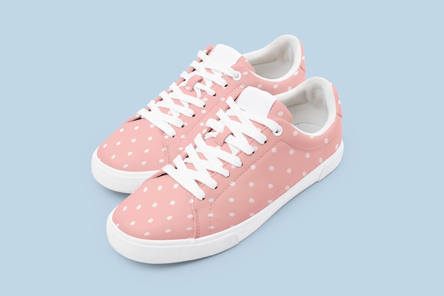 Free photo pink canvas sneakers with polka dot unisex footwear fashion