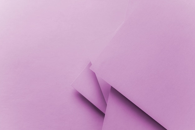 Pink colored paper textured background