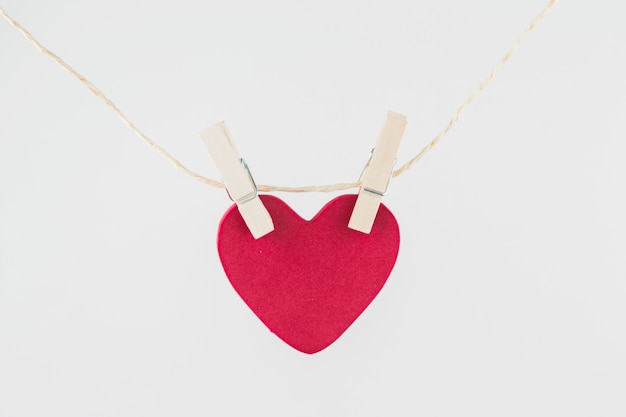 Free Photo pink heart hanging on rope 