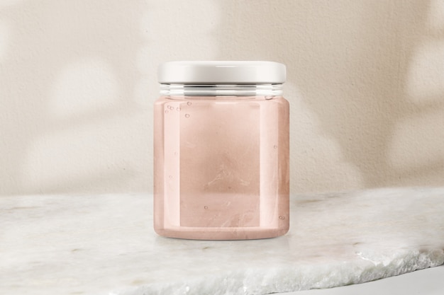 Free photo pink jelly glass jar, food product packaging with design space