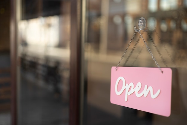 Pink open sign on window