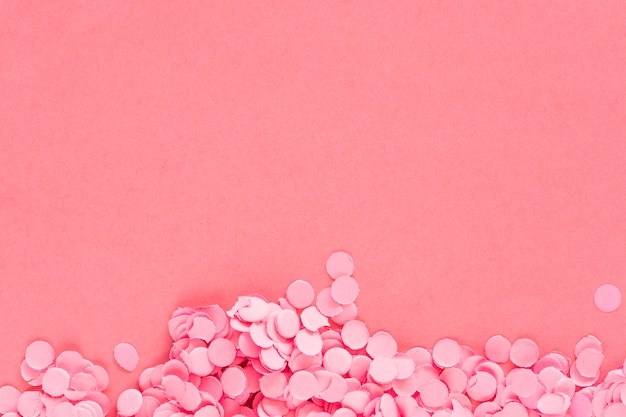 Free Photo pink paper confetti on pink