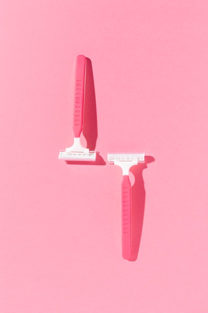 Free photo pink safe shaving razors for sensitive skin