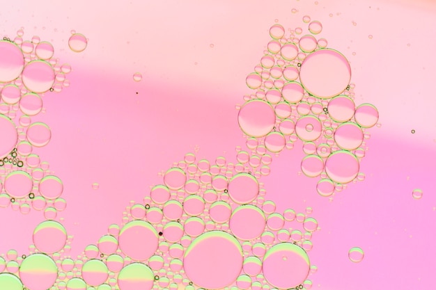 Free Photo pink shades background with transparent bubbles