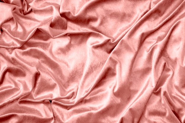 Free photo pink shiny silk fabric texture