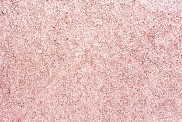 Pink shiny textured paper background