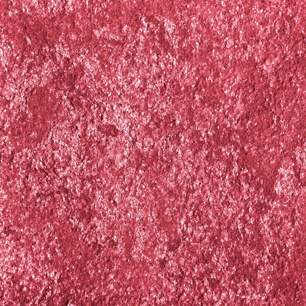 Pink shiny textured paper background