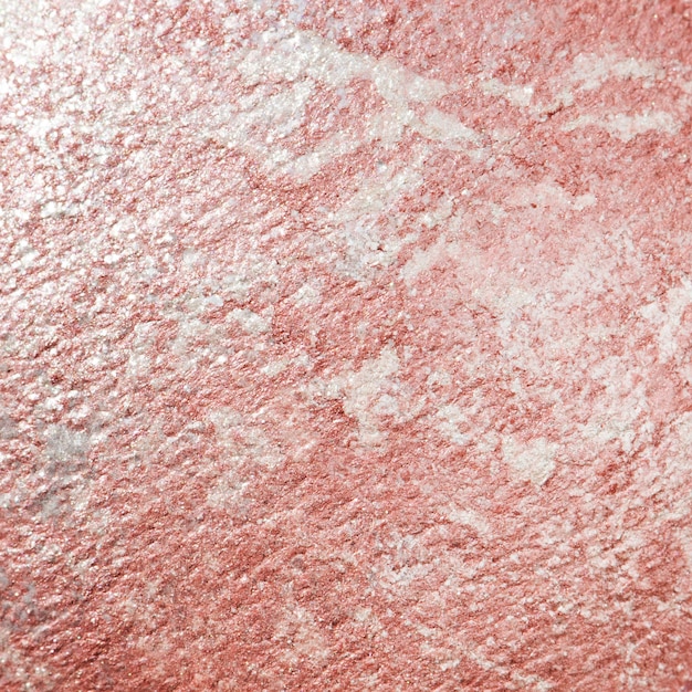 Pink shiny textured paper background