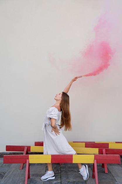 Pink smoke background with young adult