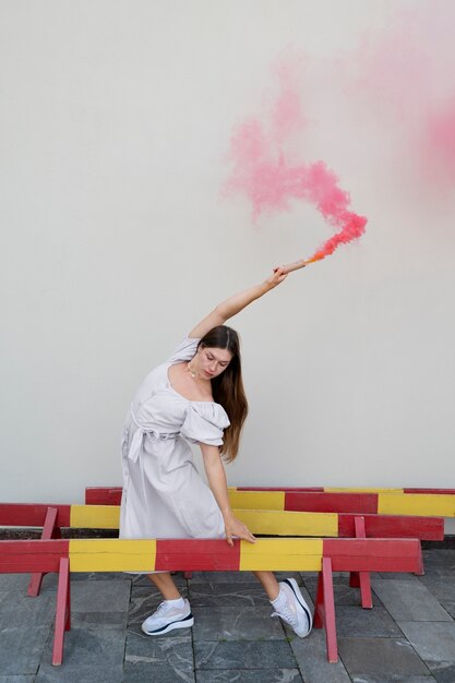 Pink smoke background with young adult