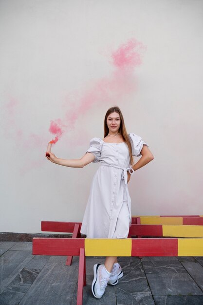 Pink smoke background with young adult