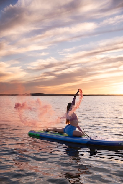 Pink smoke background with young adult