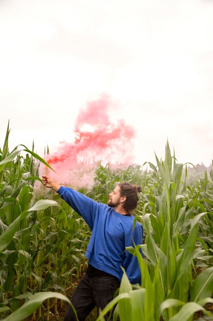 Pink smoke background with young adult