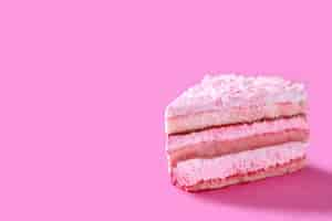 Free photo pink strawberry cake portion on pink background