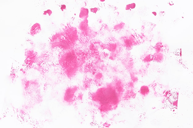 Free Photo pink watercolor splashing