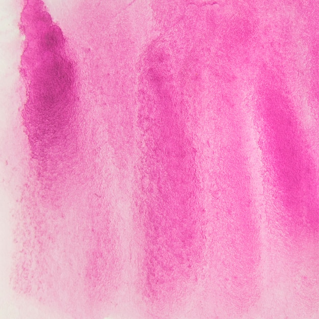 Pink watercolor textured on paper background