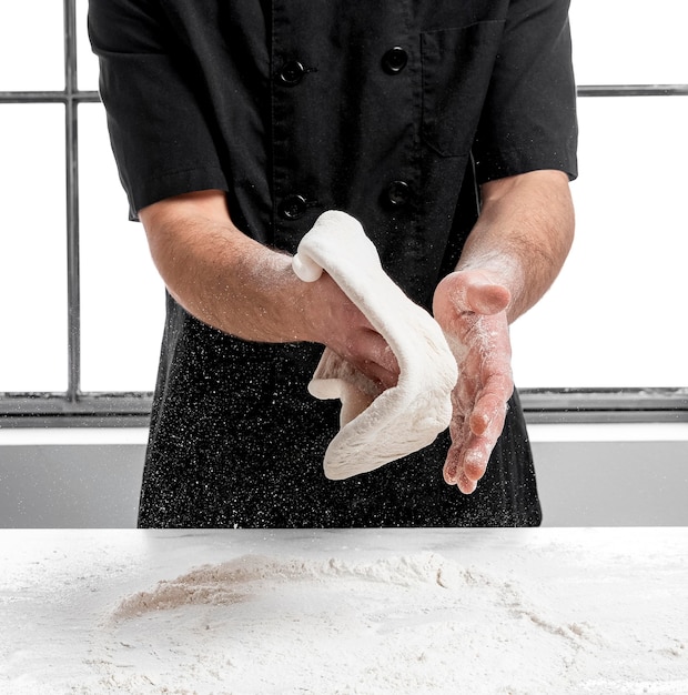 Pizza chef making pizza dough