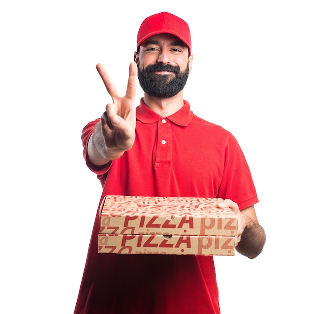 Free photo pizza delivery man counting two