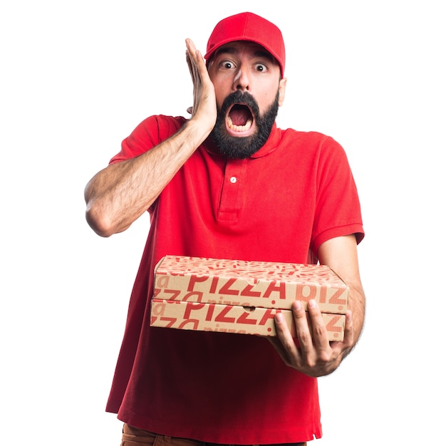 Free photo pizza delivery man doing surprise gesture