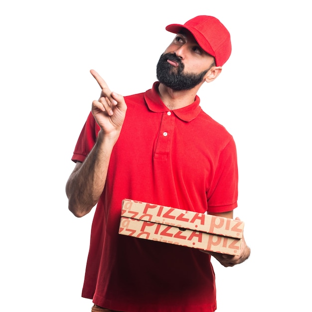 Free photo pizza delivery man thinking