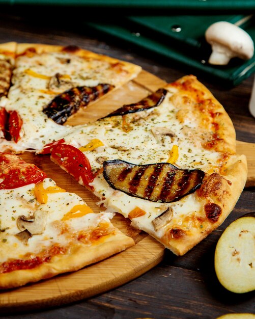 Pizza with eggplant sliced into a pieces