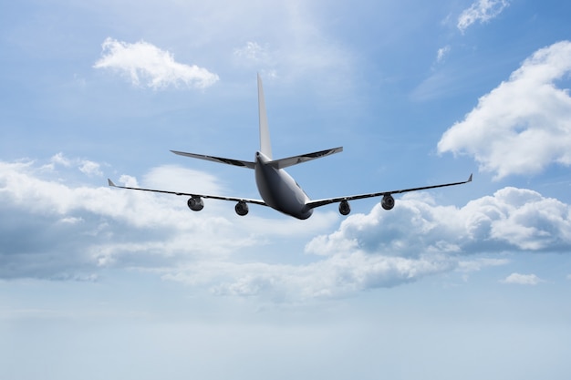 Plane flying with clouds background