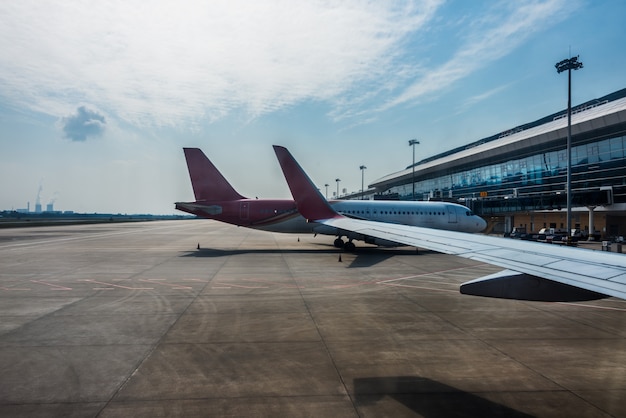 Free photo planes on runway in modern airport