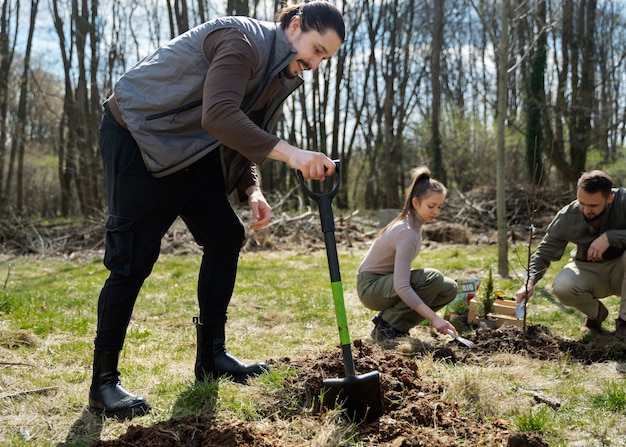 Free photo planting trees as part of reforestation process