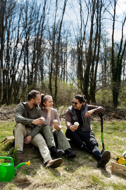 Free photo planting trees as part of reforestation process