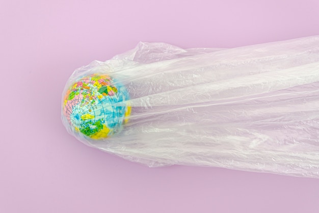 Plastic bag with planet earth inside