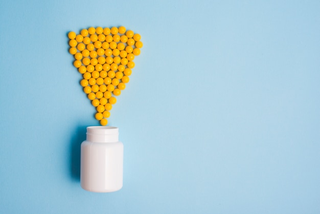 Free Photo plastic bottle and pills